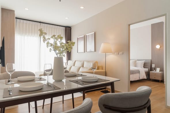 living room and bedroom of Noble Reveal