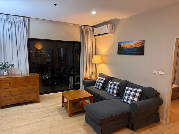 living room and bedroom of Noble Reveal