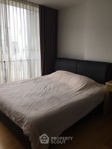 bedroom of Noble Revo Silom