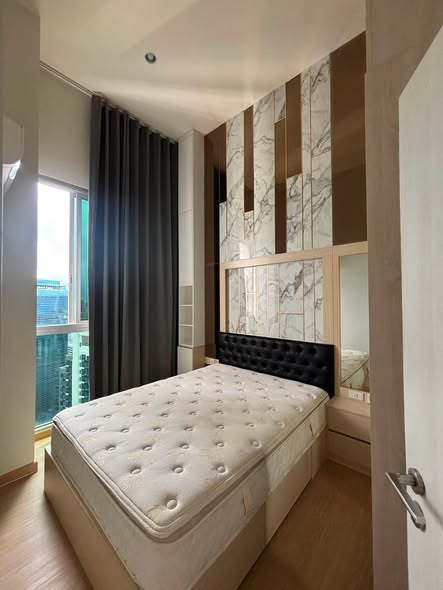 bedroom of Noble Revolve Ratchada 1