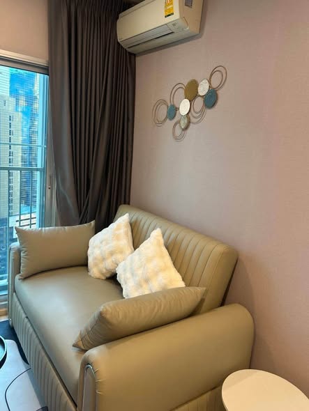bedroom and living room of Noble Revolve Ratchada 1