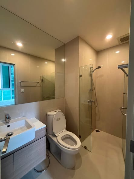 room interior and bathroom of Noble Revolve Ratchada 1