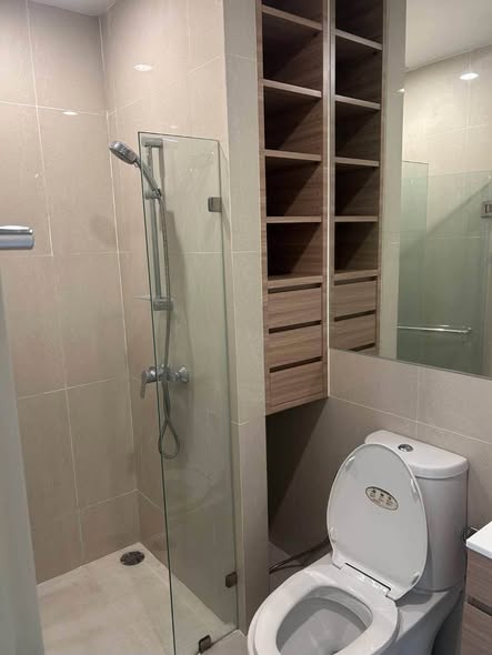 room interior and bathroom of Noble Revolve Ratchada 1
