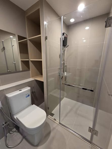 room interior and bathroom of NUE Connex Condo Don Mueang