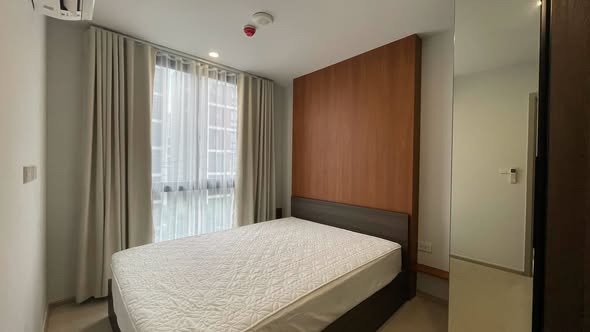 bedroom of Nue Cross Khu Khot Station (นิว ครอส คูคต สเตชัน)