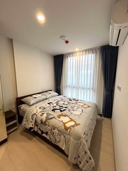 bedroom of Nue Cross Khu Khot Station (นิว ครอส คูคต สเตชัน)