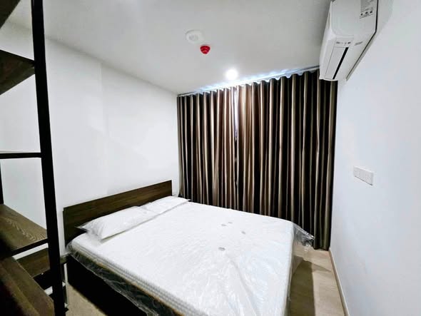 bedroom of Nue Cross Khu Khot Station (นิว ครอส คูคต สเตชัน)