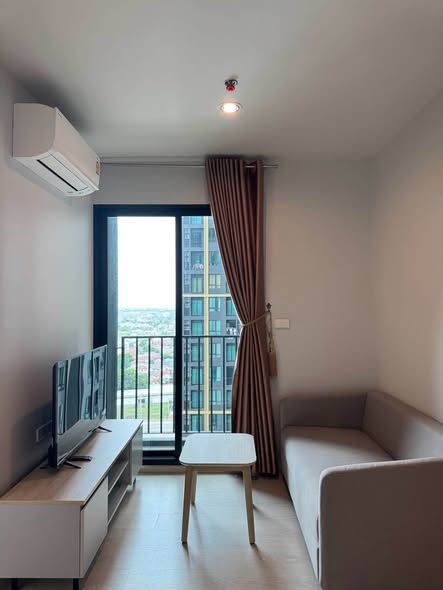 bedroom and living room of Nue Mega Plus Bangna