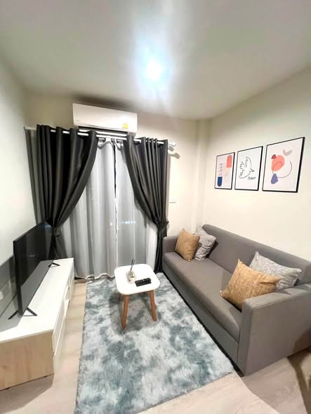 bedroom and living room of NUE Noble Srinakarin Lasalle นิว โนเบิล ศรีนครินทร์ – ลาซาล