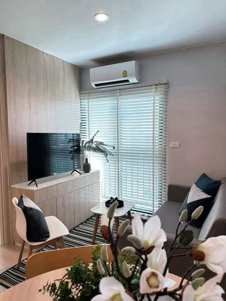 bedroom and living room of NUE Noble Srinakarin Lasalle นิว โนเบิล ศรีนครินทร์ – ลาซาล