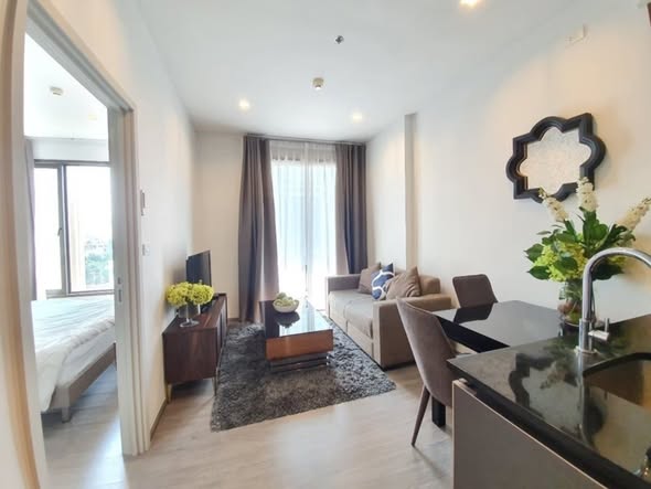 bedroom and living room of Nye by Sansiri