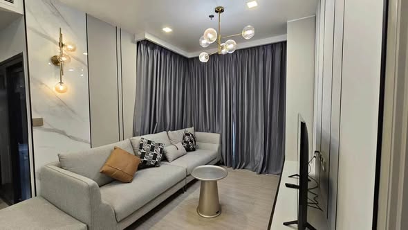 bedroom and living room of One9Five Asoke – Rama 9