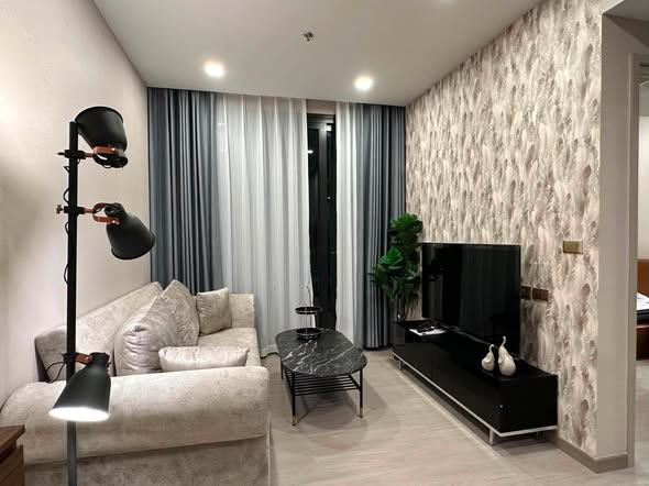 bedroom and living room of One9Five Asoke – Rama 9