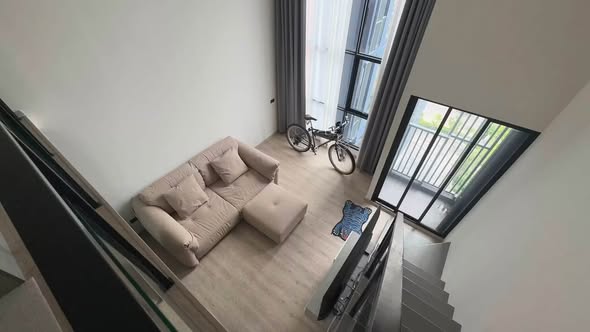 living room of Origin Plug & Play Sirindhorn Station