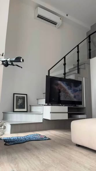 living room and kitchen of Origin Plug & Play Sirindhorn Station