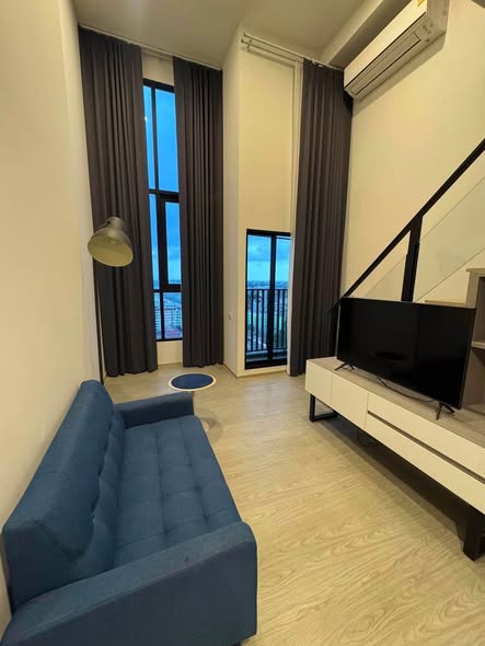 living room of Origin Plug&Play Ramkhamhaeng Triple Station