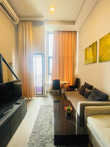 bedroom and living room of Park Origin Chula-Sam Yan