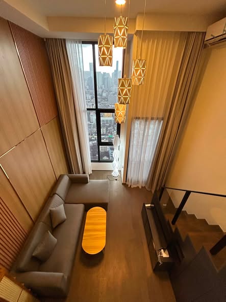 living room and bedroom of Park Origin Chula-Sam Yan