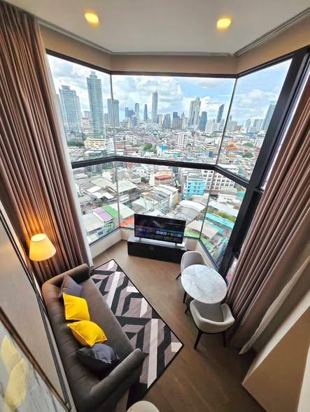 living room and bedroom of Park Origin Chula-Sam Yan