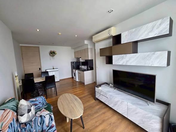 living room and kitchen of Park Origin Phrom Phong