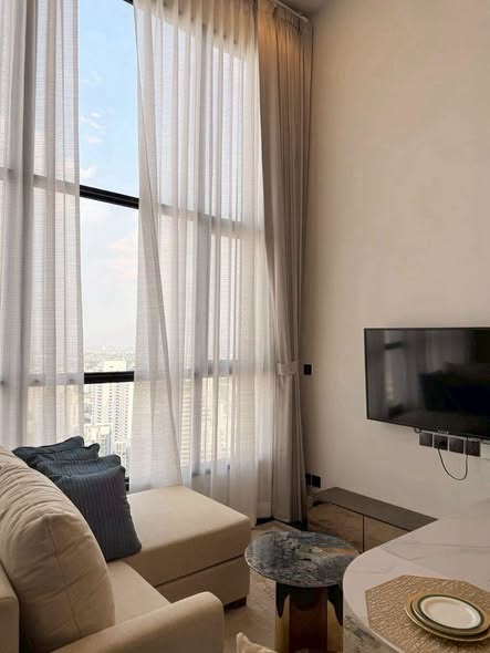 living room and bedroom of Park​ Origin​ Thonglor