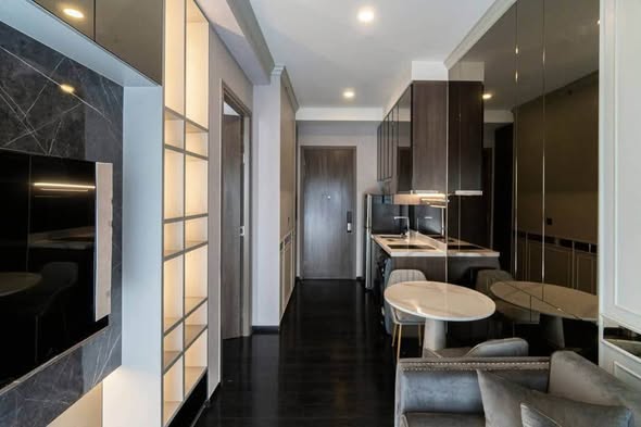 living room and kitchen of Park​ Origin​ Thonglor