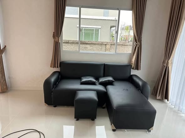 bedroom and living room of Passorn Thepharak – Bangna