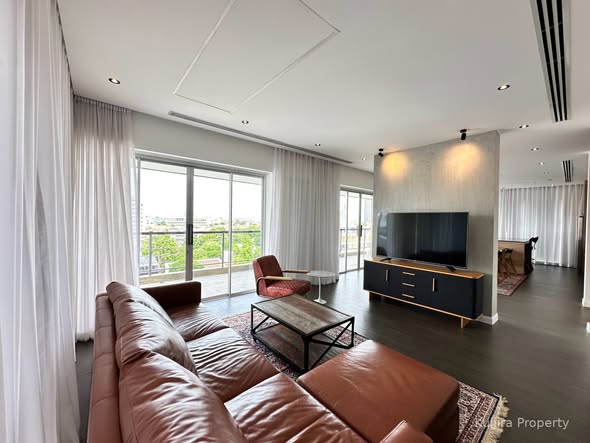 bedroom and living room of Penthouse Condominium