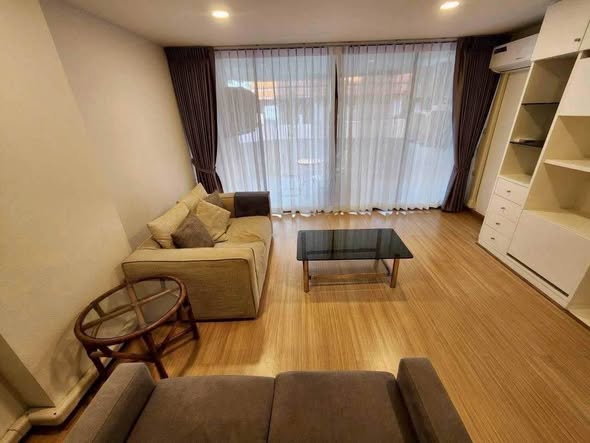 bedroom and living room of Premier Condominium