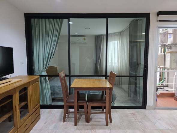 bedroom and room interior of Prime Suites Condominium