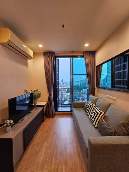 bedroom and living room of Q House Sukhumvit 79