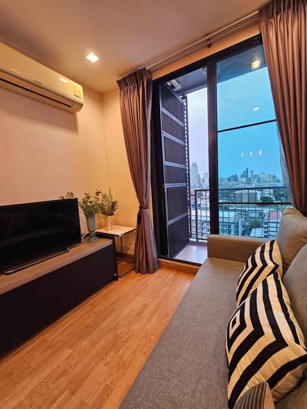 bedroom and living room of Q House Sukhumvit 79