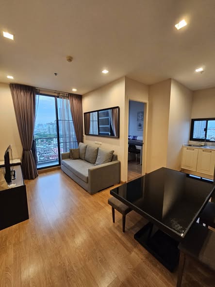 living room and bedroom of Q House Sukhumvit 79