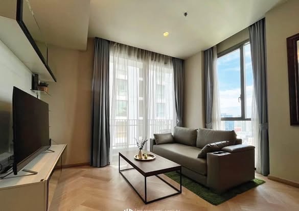 bedroom and living room of Quattro by Sansiri