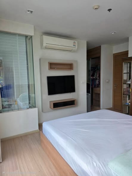 bedroom of RHYTHM Ratchada-Huaykwang