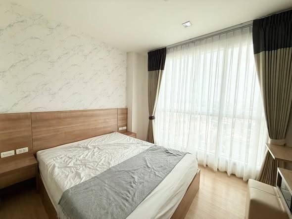 bedroom of RHYTHM Ratchada-Huaykwang