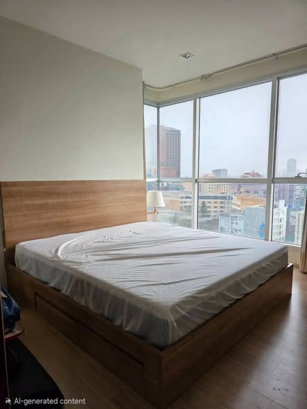 bedroom of RHYTHM Ratchada-Huaykwang