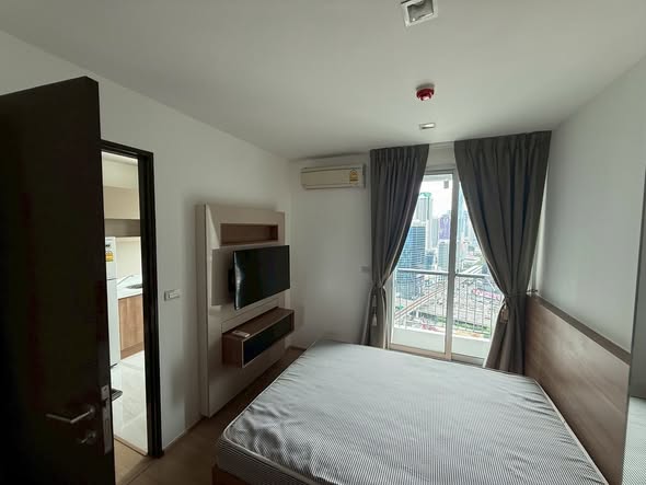 bedroom of RHYTHM Sathorn