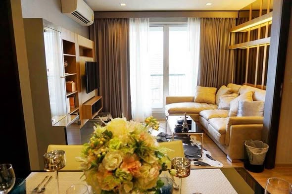 bedroom and living room of RHYTHM Sathorn