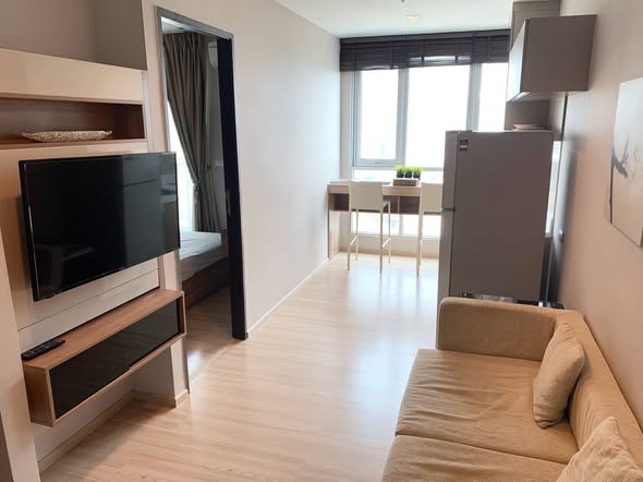 bedroom and living room of RHYTHM Sathorn