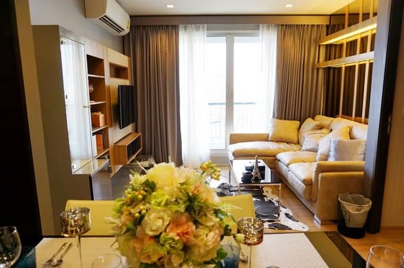 bedroom and living room of RHYTHM Sathorn
