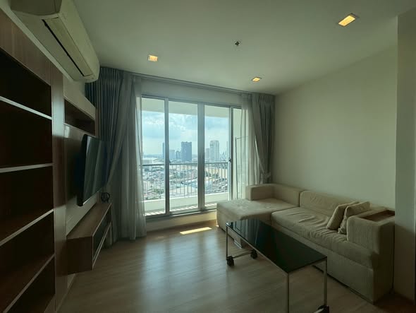 bedroom and living room of RHYTHM Sathorn