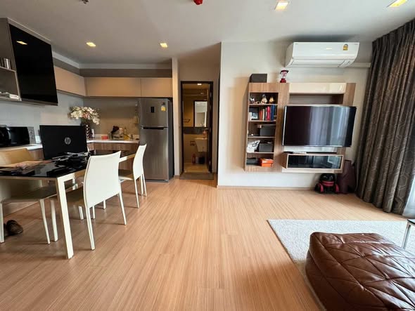 bedroom and living room of RHYTHM Sathorn
