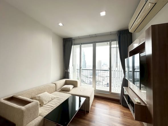 living room and bedroom of RHYTHM Sathorn