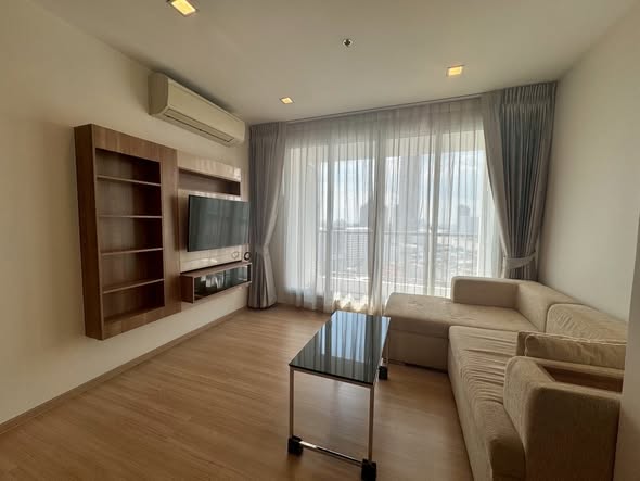 living room and bedroom of RHYTHM Sathorn