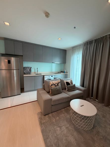 living room and bedroom of Rhythm Sukhumvit 36-38