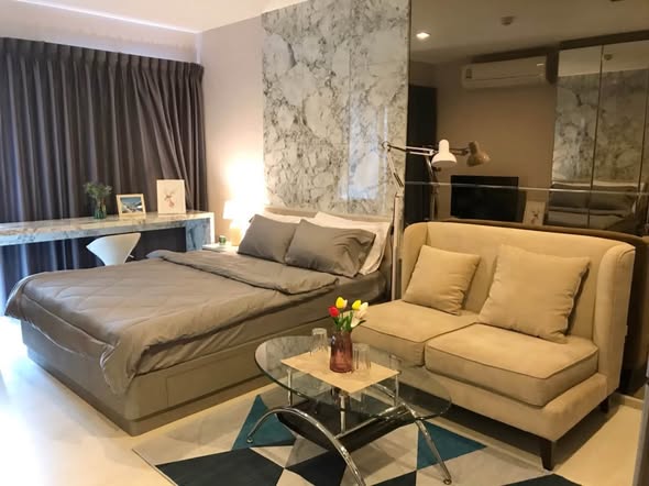 living room and bedroom of Rhythm Sukhumvit 36-38