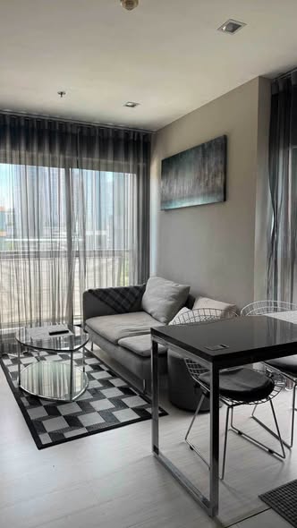 living room and bedroom of Rhythm Sukhumvit 36-38