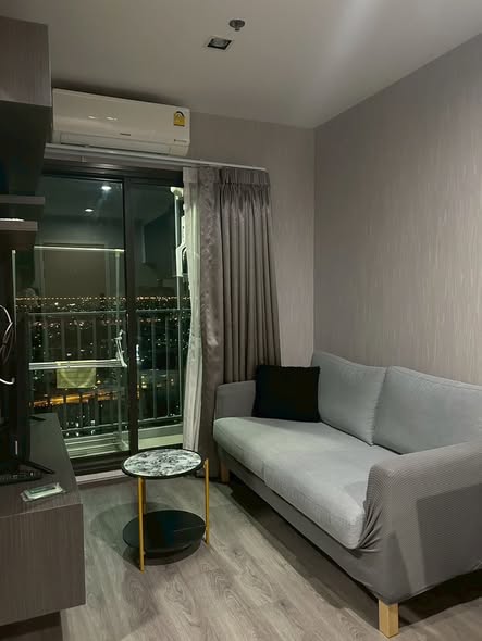 living room and bedroom of Rich Park Triple Station