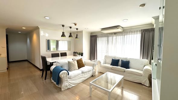 living room and bedroom of Richmond Palace Condominium